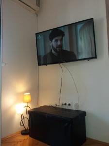 TV a/nebo společenská místnost v ubytování Obala