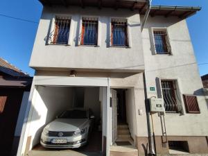 a car parked in the garage of a house at Villa Kuna in Sarajevo
