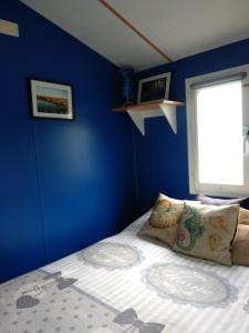 Postel nebo postele na pokoji v ubytování MOBILE HOME VUE DIRECTE SUR MER Cerbère