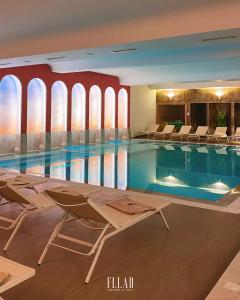 Bazén v ubytování Fllad Resort & SPA Durres nebo v jeho okolí
