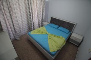 Postel nebo postele na pokoji v ubytování IRINA HOME