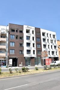 an apartment building on the side of a street at Frajla in Novi Sad