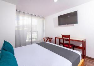 Hotel Basan Plaza客房内的一张或多张床位