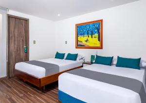 Hotel Basan Plaza客房内的一张或多张床位