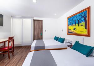 Hotel Basan Plaza客房内的一张或多张床位
