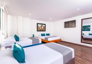 Hotel Basan Plaza客房内的一张或多张床位