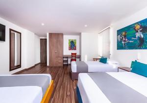 Hotel Basan Plaza客房内的一张或多张床位