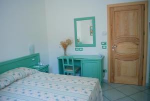 En eller flere senger på et rom på La Vispa Teresa