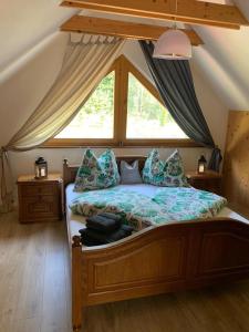 Postel nebo postele na pokoji v ubytování Chata Lipa