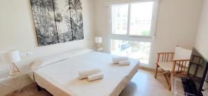 Postel nebo postele na pokoji v ubytování Apartamento Estrella del Mar by DENIA COSTA