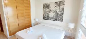 Postel nebo postele na pokoji v ubytování Apartamento Estrella del Mar by DENIA COSTA
