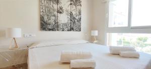 Postel nebo postele na pokoji v ubytování Apartamento Estrella del Mar by DENIA COSTA