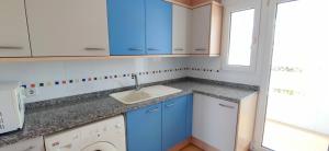 Kuchyň nebo kuchyňský kout v ubytování Apartamento Estrella del Mar by DENIA COSTA