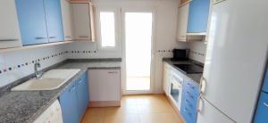 Kuchyň nebo kuchyňský kout v ubytování Apartamento Estrella del Mar by DENIA COSTA