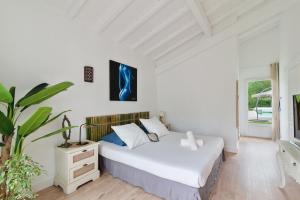 Ein Bett oder Betten in einem Zimmer der Unterkunft Biarritz 64 Road House