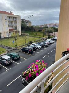 a view of a parking lot with cars parked at Sweet Home in Ponta Delgada