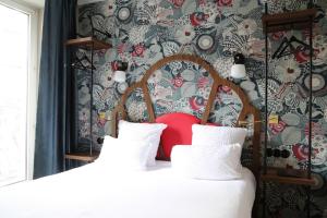 Letto o letti in una camera di Hotel André Latin
