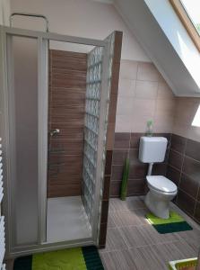 Kúpeľňa v ubytovaní Fónagy Apartmanok