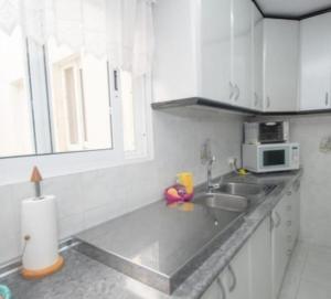 A kitchen or kitchenette at La duquesa