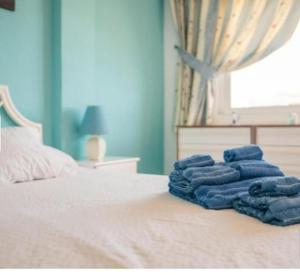 A bed or beds in a room at La duquesa