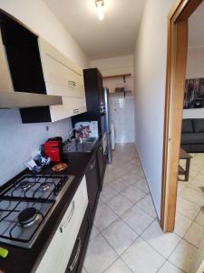 Kuchyň nebo kuchyňský kout v ubytování Scala dei Turchi Apartment