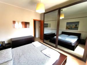 Postel nebo postele na pokoji v ubytování Scala dei Turchi Apartment