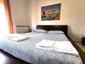 Postel nebo postele na pokoji v ubytování Scala dei Turchi Apartment
