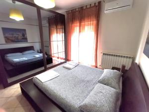 Postel nebo postele na pokoji v ubytování Scala dei Turchi Apartment