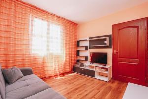 TV a/nebo společenská místnost v ubytování Villa Agava