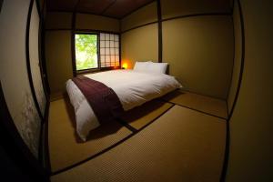 HA-MON Slope Side Hotel and Private Chalet客房内的一张或多张床位