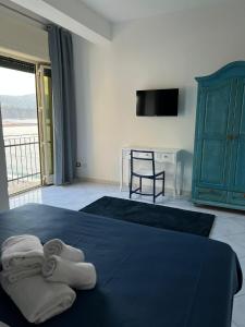A bed or beds in a room at Residenza Mare di Sotto Sorrento