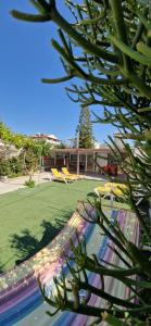 a view of a yard with a pool and a house at HARMONY villa in Kokkíni Khánion