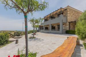 a building with a skate park in front of it at Tramonto Suites in Xi