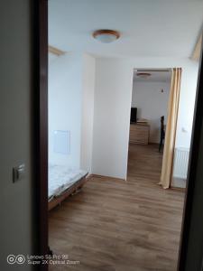 Wellness apartmán Beavital 객실 침대