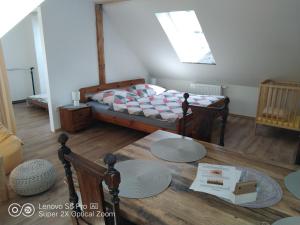 Wellness apartmán Beavital 객실 침대