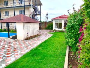 Zahrada ubytování Guest House “Aura”