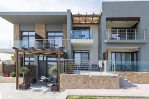 a rendering of a house with a balcony at Tramonto Suites in Xi