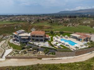 an aerial view of a villa with a swimming pool at Tramonto Suites in Xi