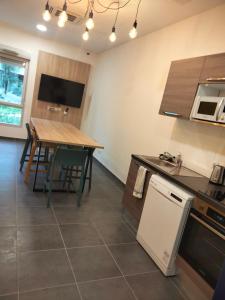 Køkken eller tekøkken på Résidence Nemea mondial 98