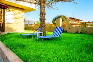 Κήπος έξω από το Seascape Residence Stavros