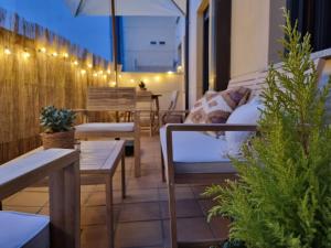 Posedenie v ubytovaní Salamanca Rentals - Apartamento con terraza a 1 minuto de la Plaza Mayor