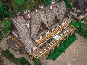 an overhead view of a house with a roof at Tatra House Residence in Zakopane