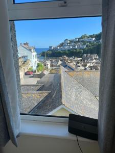a window with a view of a roof at Penwyn Bed and Breakfast in Looe