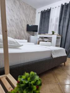 Letto o letti in una camera di Studio Vlora