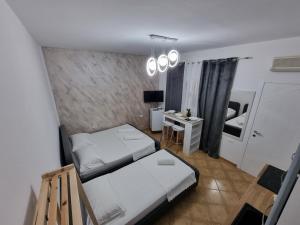 Letto o letti in una camera di Studio Vlora