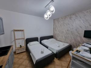 Letto o letti in una camera di Studio Vlora