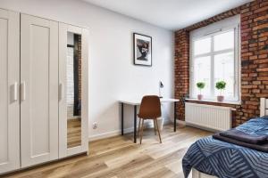 Posteľ alebo postele v izbe v ubytovaní Archirent Apartament Waryńskiego