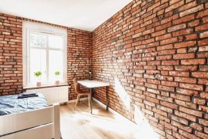 Posteľ alebo postele v izbe v ubytovaní Archirent Apartament Waryńskiego