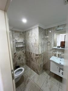 Koupelna v ubytování Yaman Suite Apart
