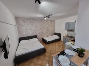 Letto o letti in una camera di Studio Vlora